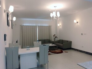 Standard Apartment, 2 Bedrooms, 2 Bathrooms | Living area | Flat-screen TV - Stout Apartments (Manama)