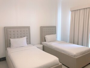 Standard Apartment, 2 Bedrooms, 2 Bathrooms | 2 bedrooms, premium bedding, in-room safe, iron/ironing board - Stout Apartments (Manama)