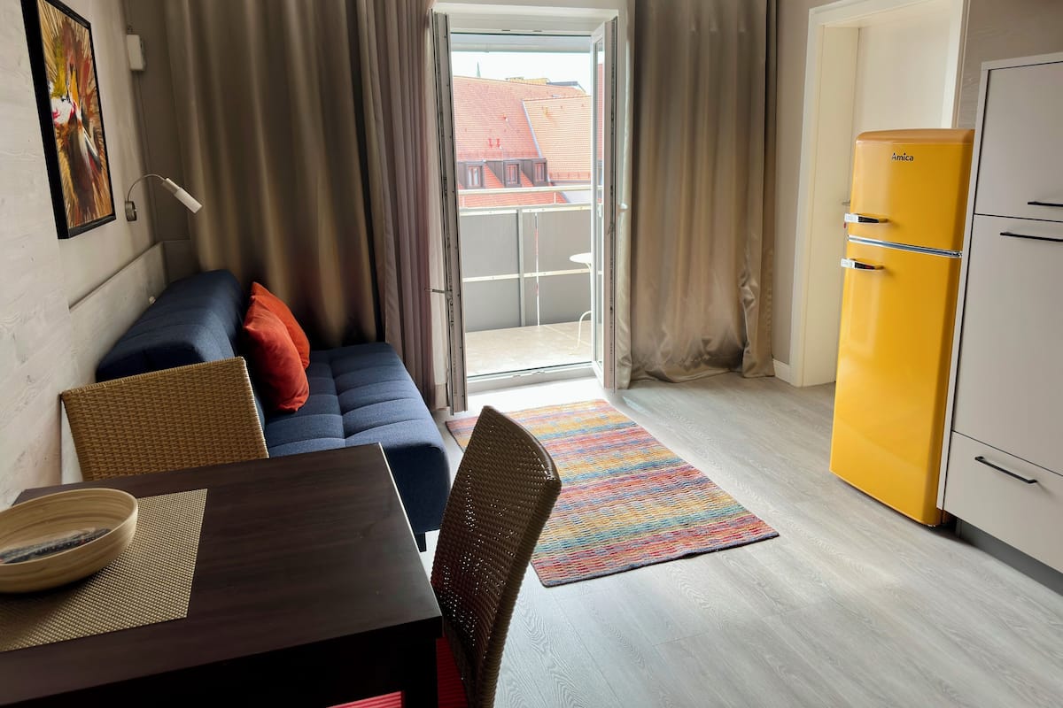 Comfort Apartment, Balcony | Living area | Flat-screen TV