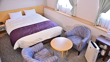 Down comforters, desk, blackout drapes, iron/ironing board