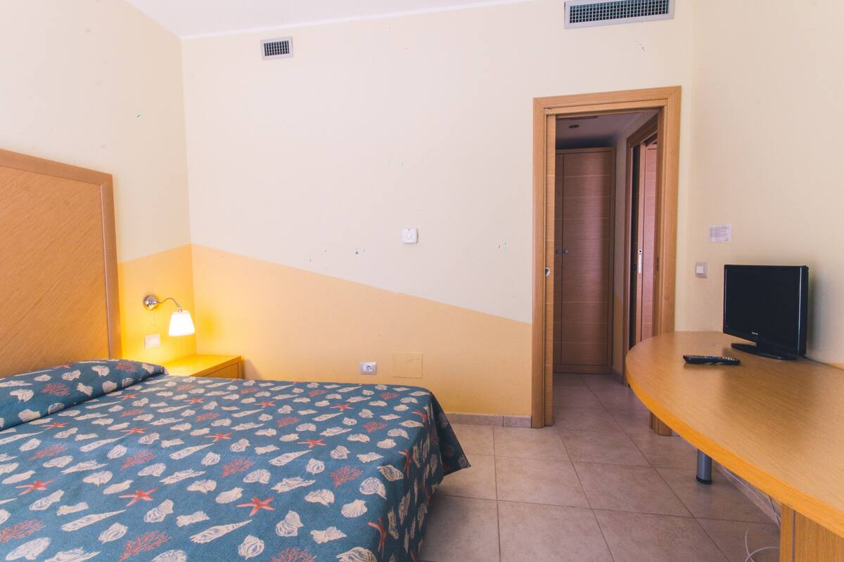 Suite familiar, habitaciones comunicadas | Sistema de insonorización y accesible en silla de ruedas