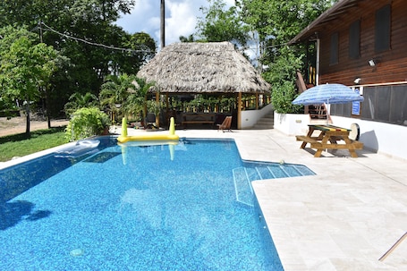 Outdoor pool. Set in jungle, Wild Orchid is a self catering 2 bedroom cabin with private porch