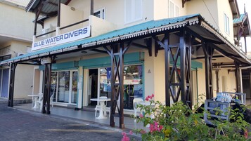 Beach nearby, white sand, sun loungers, beach umbrellas
