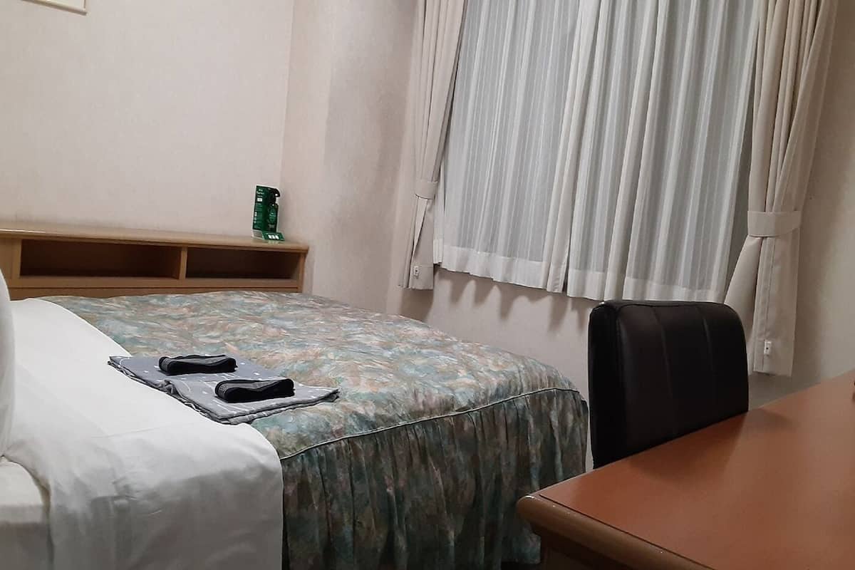 Blackout drapes, iron/ironing board, free WiFi