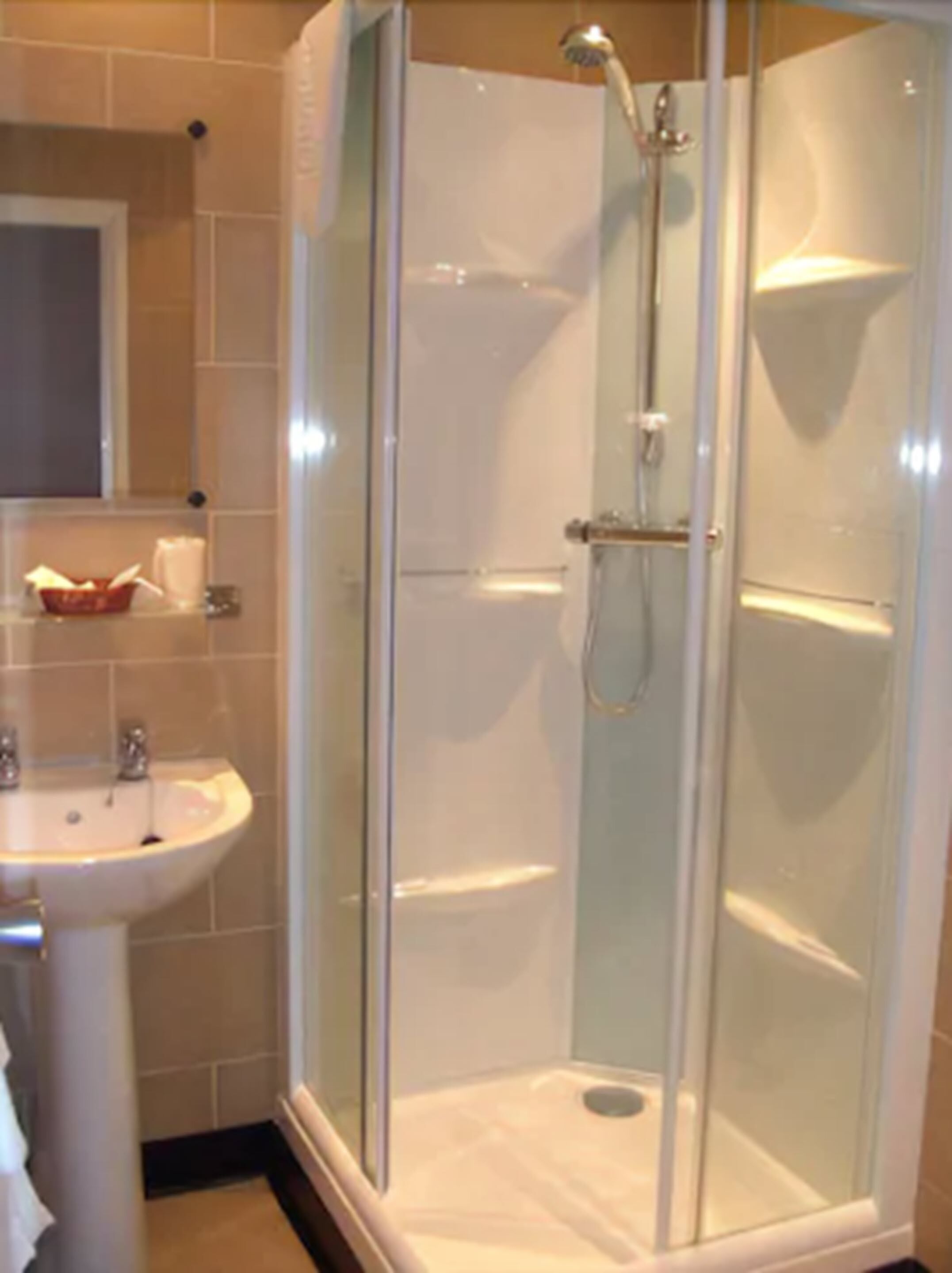 shower, free toiletries, hair dryer, towels