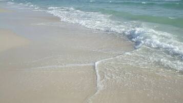 On the beach, sun-loungers