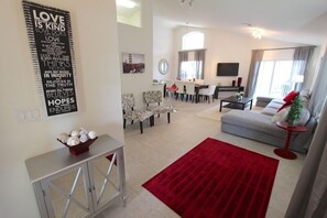 Appartement, plusieurs chambres | Salle de séjour