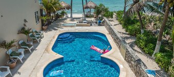 Mesmerizing view of Half Moon Bay from this beachfront condo with pool!