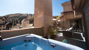 A hot tub on a balcony with a mountain view. - Remodeled Penthouse - Ski In/Out - Huge Decks/Views - Private Hot Tub/Sauna (Durango)