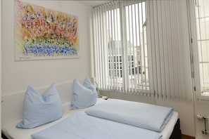 Deluxe Apartment | Hypo-allergenic bedding, blackout drapes, iron/ironing board, free WiFi