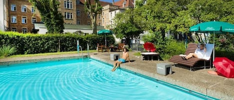 Seasonal outdoor pool, open 7:00 AM to 8:00 PM, sun loungers