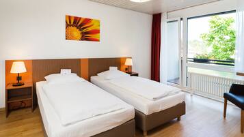 Desk, blackout drapes, soundproofing, free WiFi