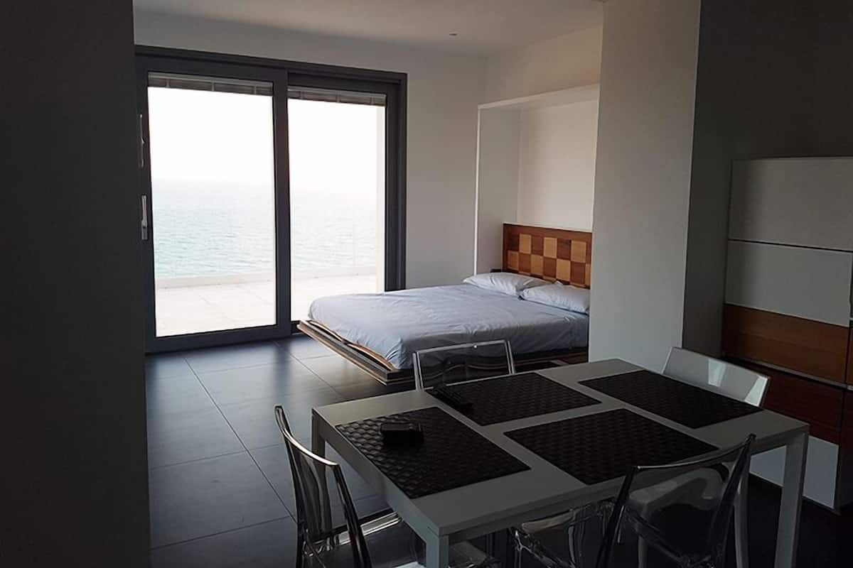 Luxury Apartment, Multiple Beds, Terrace, Sea View | In-room dining