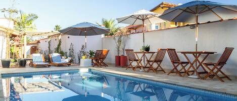 Outdoor pool, open 10:00 AM to 10:00 PM, pool umbrellas, pool loungers