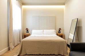 Familie tweepersoonskamer | Luxe beddengoed, donsdekens, pillowtop-bedden, een minibar