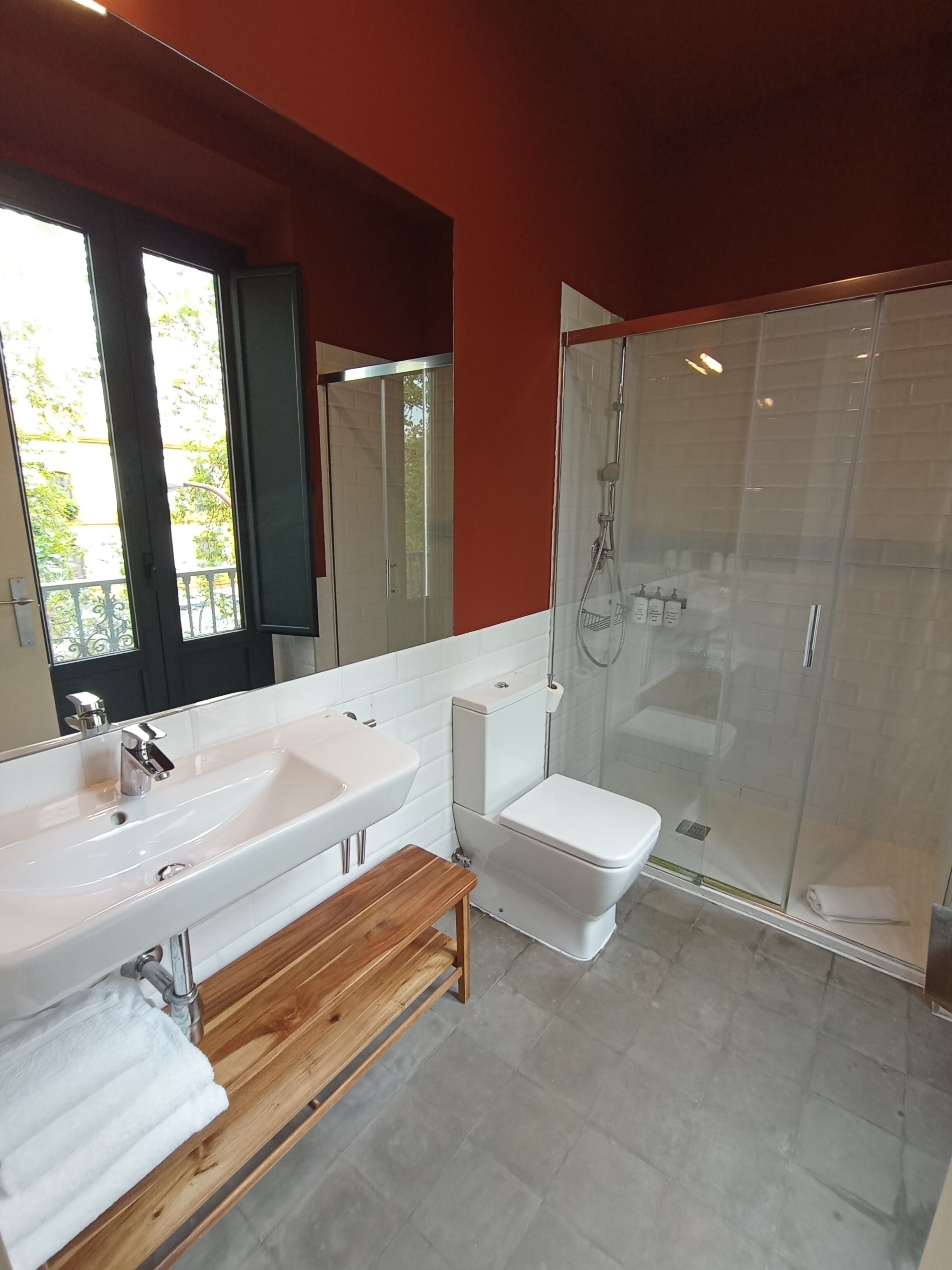 deluxe room with balcony or patio | bathroom | shower, rainfall showerhead, free toiletries, hair dryer