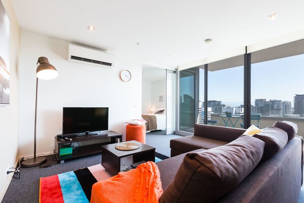 Premium Apartment, 1 Bedroom, Balcony | Living room | Flat-screen TV - ALLINDA, 1BDR Melbourne Apartment (Melbourne)