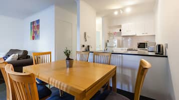 Family Apartment, 2 Bedrooms | Private kitchen | Full-size fridge, microwave, oven, stovetop