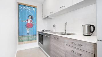 Premium Apartment, 2 Bedrooms, Balcony | Private kitchen | Full-size fridge, microwave, oven, stovetop