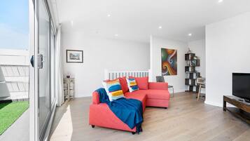 Premium Apartment, 2 Bedrooms, Balcony | Living area | 40-inch flat-screen TV with digital channels, TV