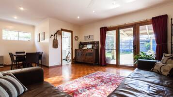 Family House, 3 Bedrooms | Living room | 40-inch flat-screen TV with digital channels, TV