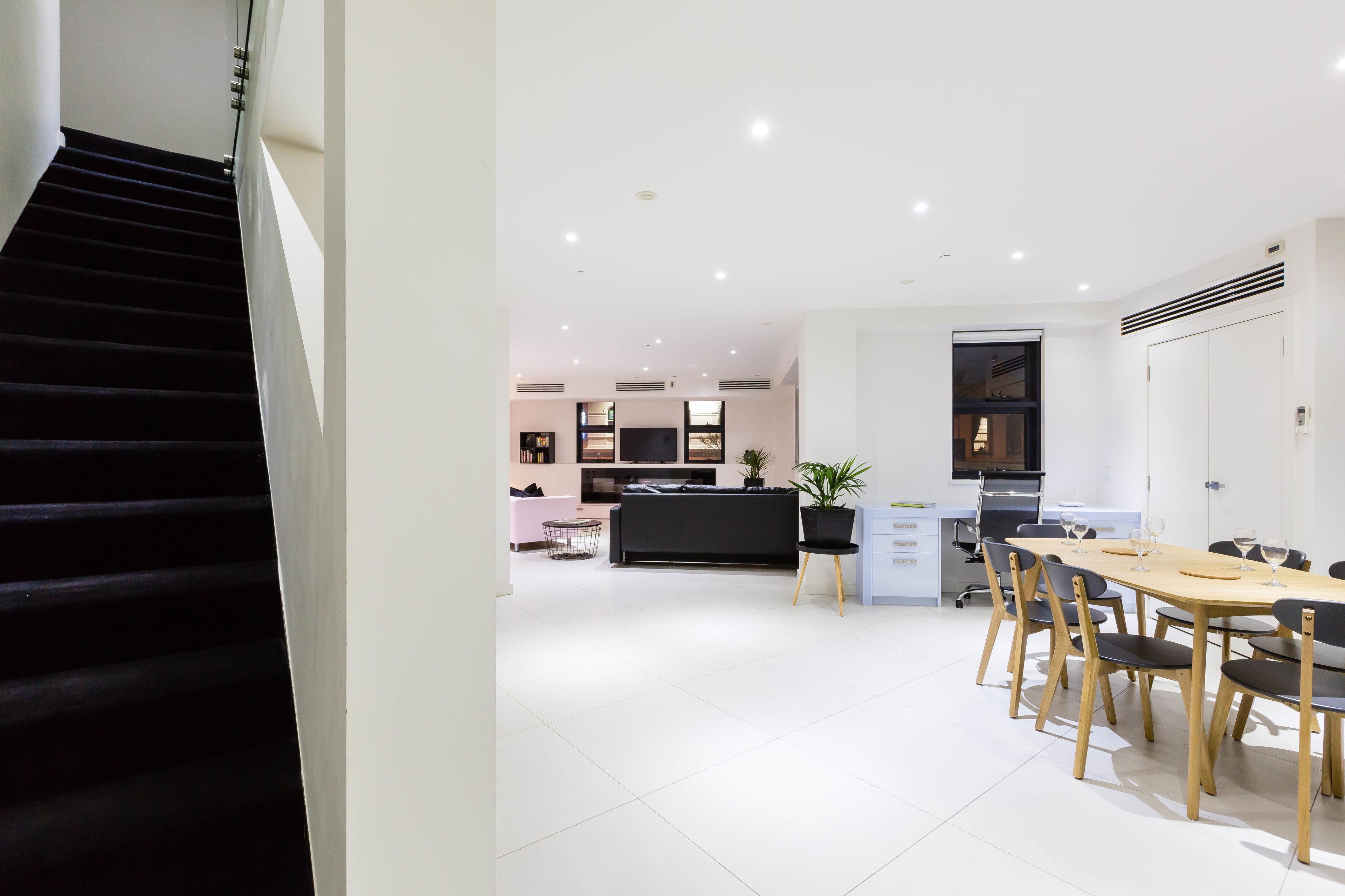 Deluxe Apartment, 3 Bedrooms | Living area | Flat-screen TV