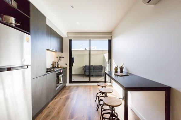 Premium Apartment, 1 Bedroom, Balcony | Private kitchen | Full-sized fridge, microwave, oven, stovetop - MAXINE, 1BDR Collingwood Apartment (Collingwood)