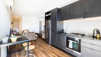 Premium Apartment, 1 Bedroom, Balcony | Private kitchen | Full-sized fridge, microwave, oven, stovetop