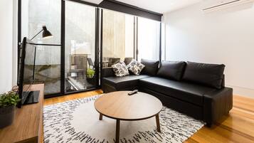 Premium House, 4 Bedrooms, Terrace | Living room | Flat-screen TV