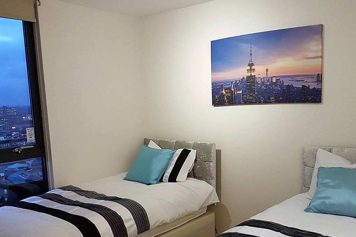 Premium bedding, laptop workspace, soundproofing, iron/ironing board