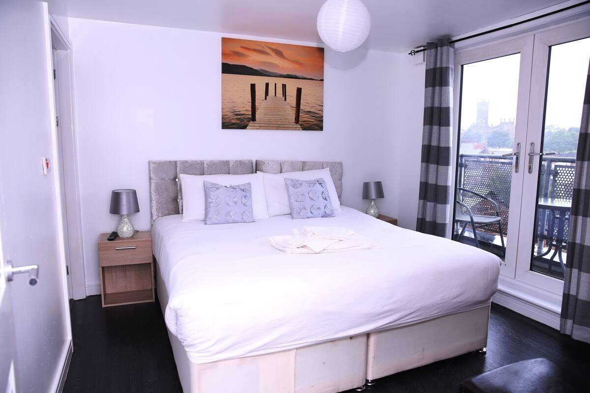Premium bedding, laptop workspace, soundproofing, iron/ironing board