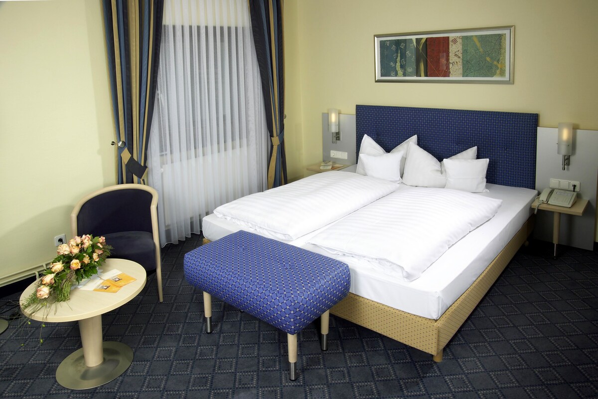 Tweepersoonskamer | Een minibar, een bureau, gratis wifi, beddengoed