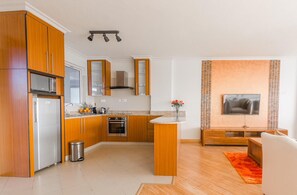 Luxury Apartment, 1 Bedroom | Private kitchen | Full-size fridge, microwave, oven, electric kettle - Lymack Suites (Nairobi)
