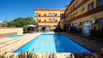 Outdoor pool, pool umbrellas, pool loungers