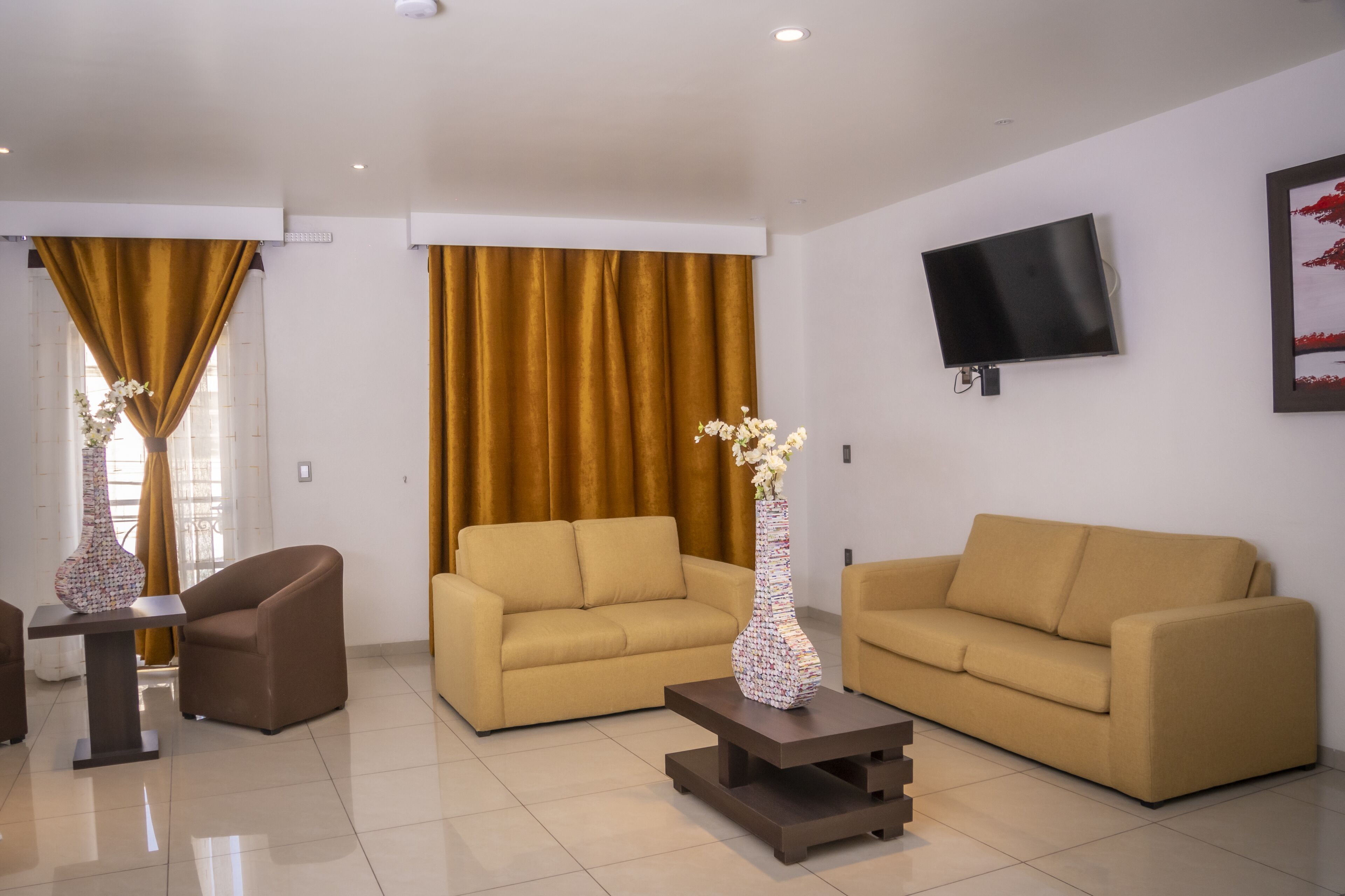 premium suite | living area | flat-screen tv