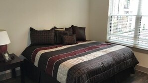Standard Apartment, 2 Bedrooms, Kitchen, Pool View | 1 bedroom, premium bedding, iron/ironing board, free WiFi