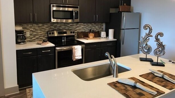 Standard Apartment, 2 Bedrooms, Kitchen, Pool View | Private kitchen | Coffee/tea maker, fridge, microwave, oven