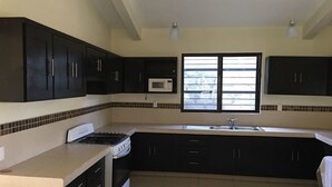 Family Apartment, 4 Bedrooms, Kitchenette | Private kitchenette | Coffee/tea maker, fridge, microwave, oven - Xilitla Tours (Xilitla)