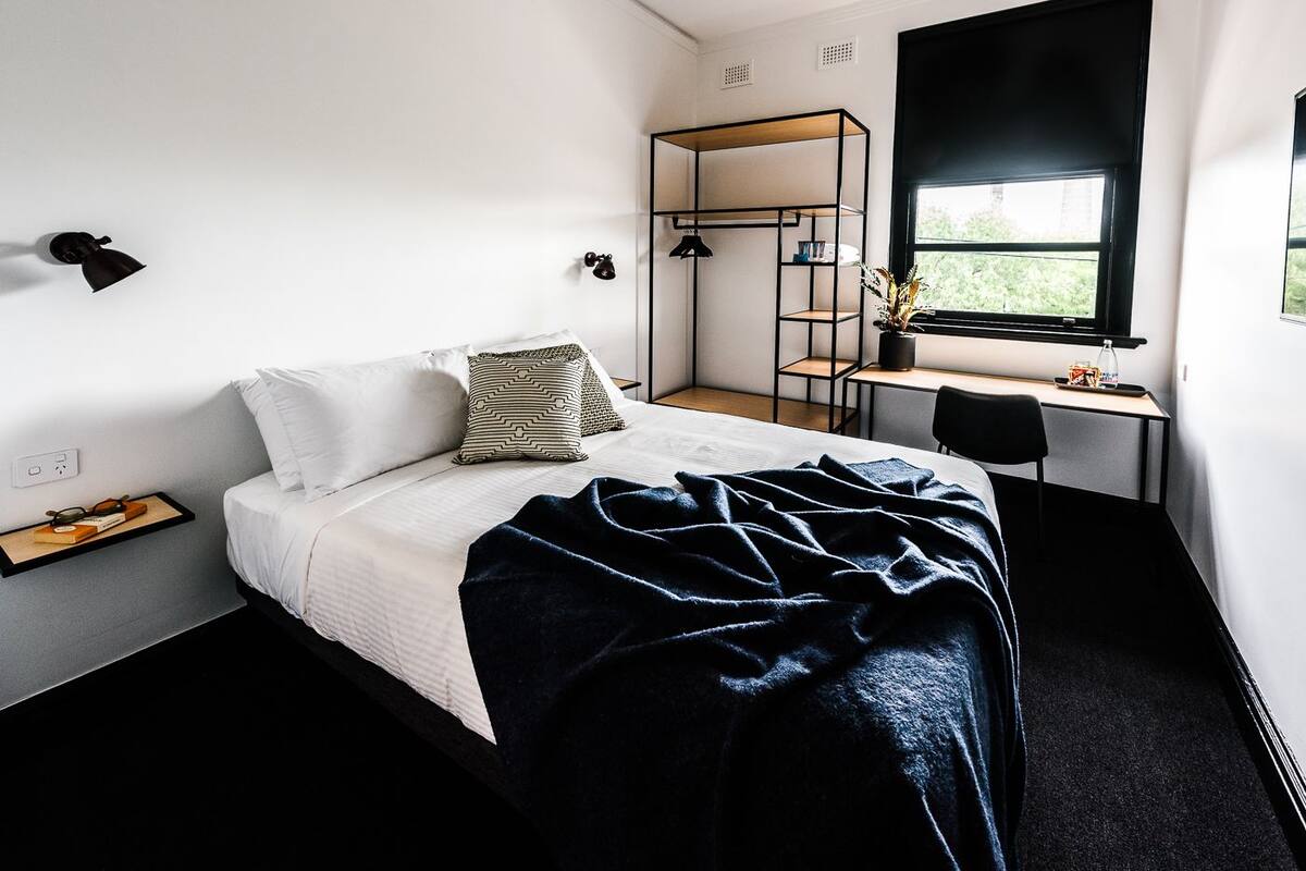 room, 1 queen bed, shared bathroom | premium bedding, desk, iron/ironing board, free wifi