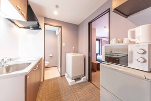 Habitación familiar, para no fumadores | Cocina privada | Refrigerador y microondas