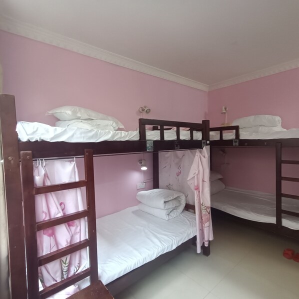 A bunk bed room with pink walls, white bedding, and a wooden ladder. - How Flower Hostel Yangshuo (Guilin)