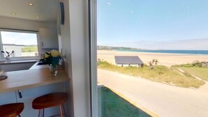 A kitchen with a view of the beach. - B27 The Lair, Riviere Towans (Hayle)