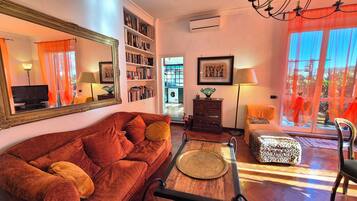 Smart TV, DVD player, books, music library