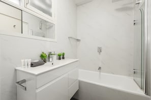 Apartment, 2 Bedrooms | Bathroom | Shower, free toiletries, hair dryer, towels