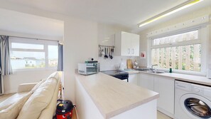 Fridge, microwave, oven, stovetop - Brian View is a chalet perfect for families and friends to explore St. Ives Bay and Cornwall beyond (Hayle)