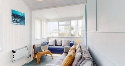 A beachside home from home with comfortable accommodation for up to six guests