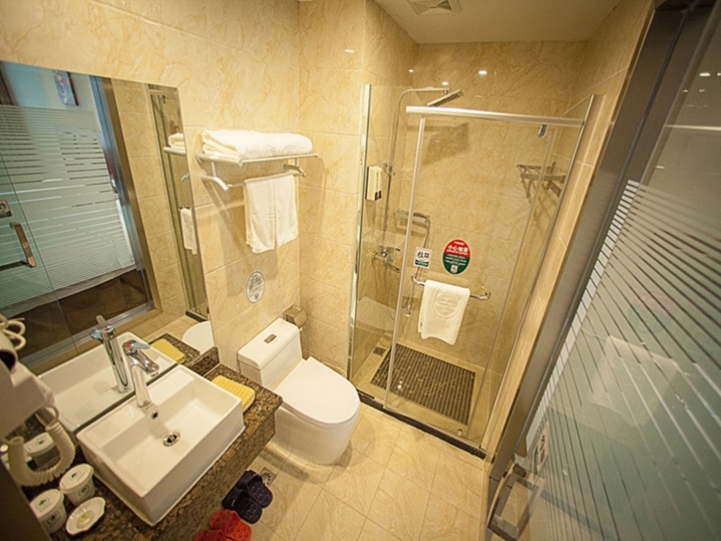 Shower, free toiletries, hair dryer, slippers
