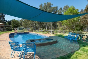 Outdoor pool, open 8:30 AM to 8:30 PM, pool umbrellas, sun loungers