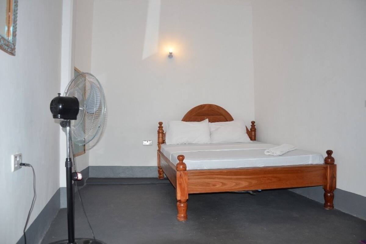 Deluxe Double Room, Ocean View | 1 bedroom, in-room safe, iron/ironing board