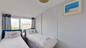 1 chambre, fer et planche à repasser, draps fournis